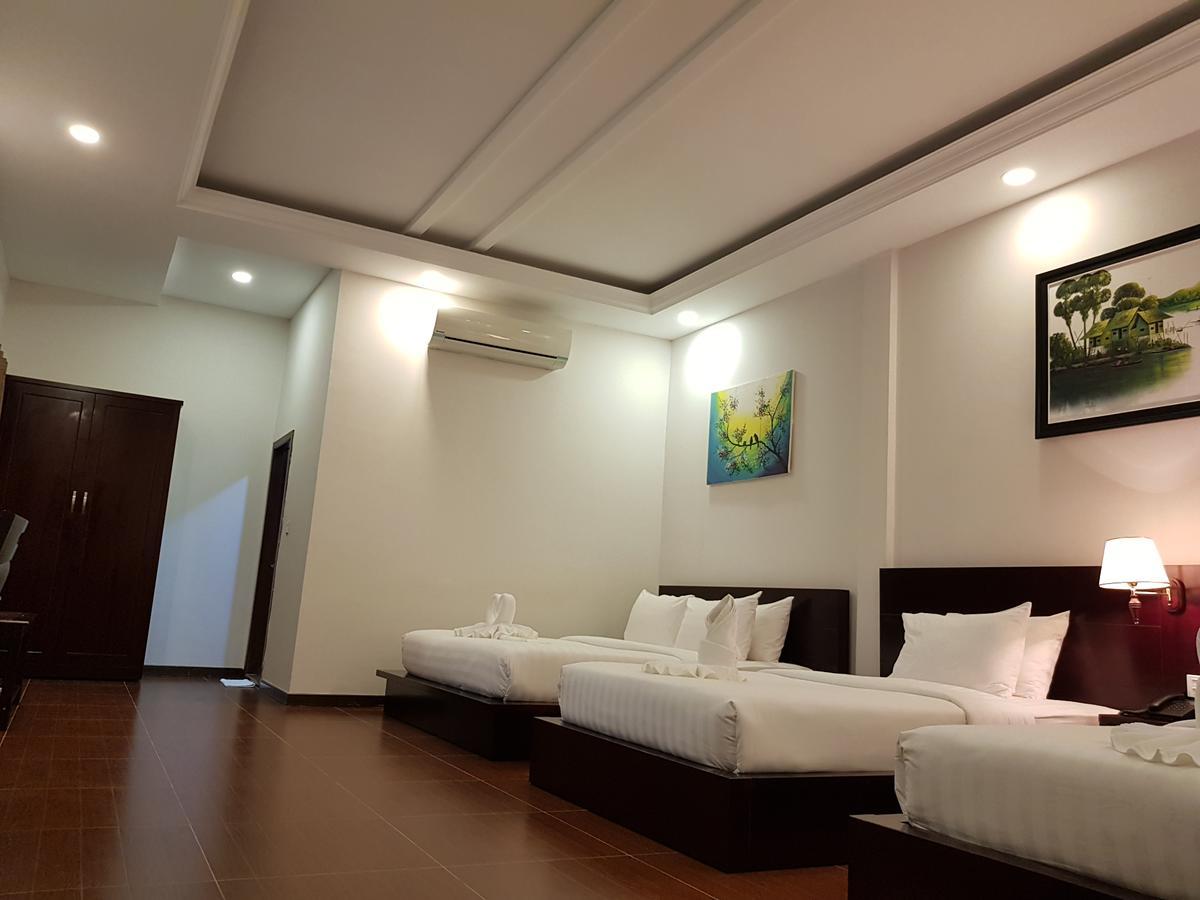Golden Apple Hotel - Airport Phnom Penh Bagian luar foto