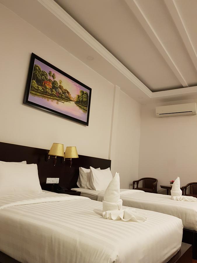 Golden Apple Hotel - Airport Phnom Penh Bagian luar foto