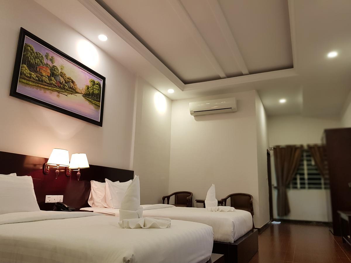 Golden Apple Hotel - Airport Phnom Penh Bagian luar foto