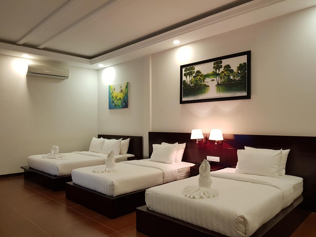 Golden Apple Hotel - Airport Phnom Penh Bagian luar foto