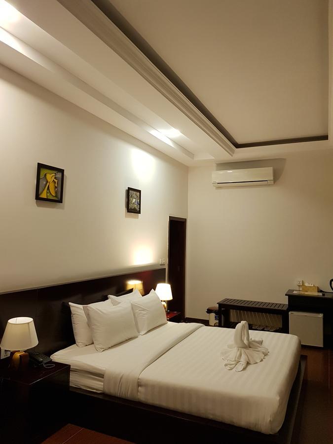 Golden Apple Hotel - Airport Phnom Penh Bagian luar foto