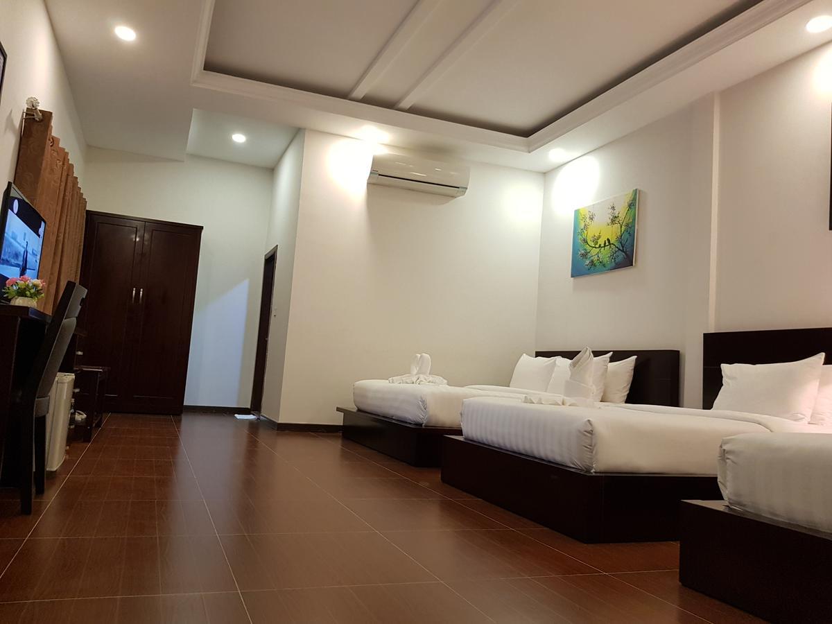 Golden Apple Hotel - Airport Phnom Penh Bagian luar foto